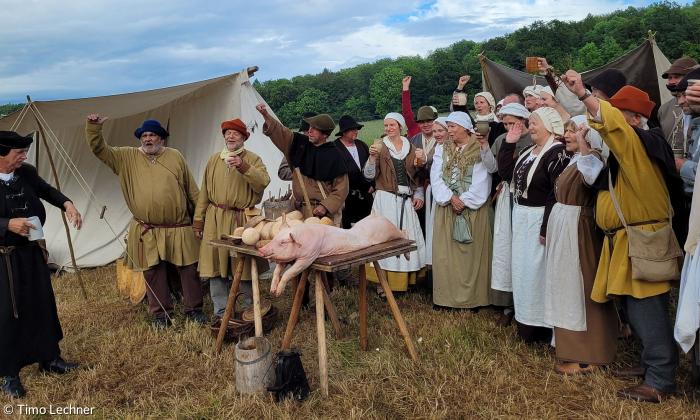 Thomas Müntzer (links) mit seinem Bauernhaufen