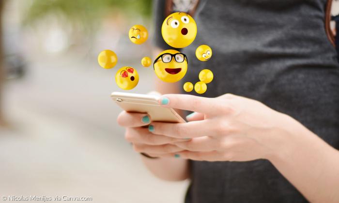 Emojis, die von einem Handy wegfliegen