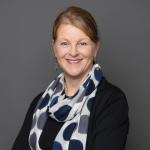 Eine Frau, sie lächelt