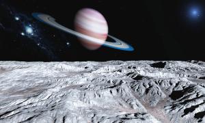 Ein Planet mit Ringen über einer Mondlandschaft