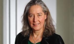 Eine Frau, sie lächelt